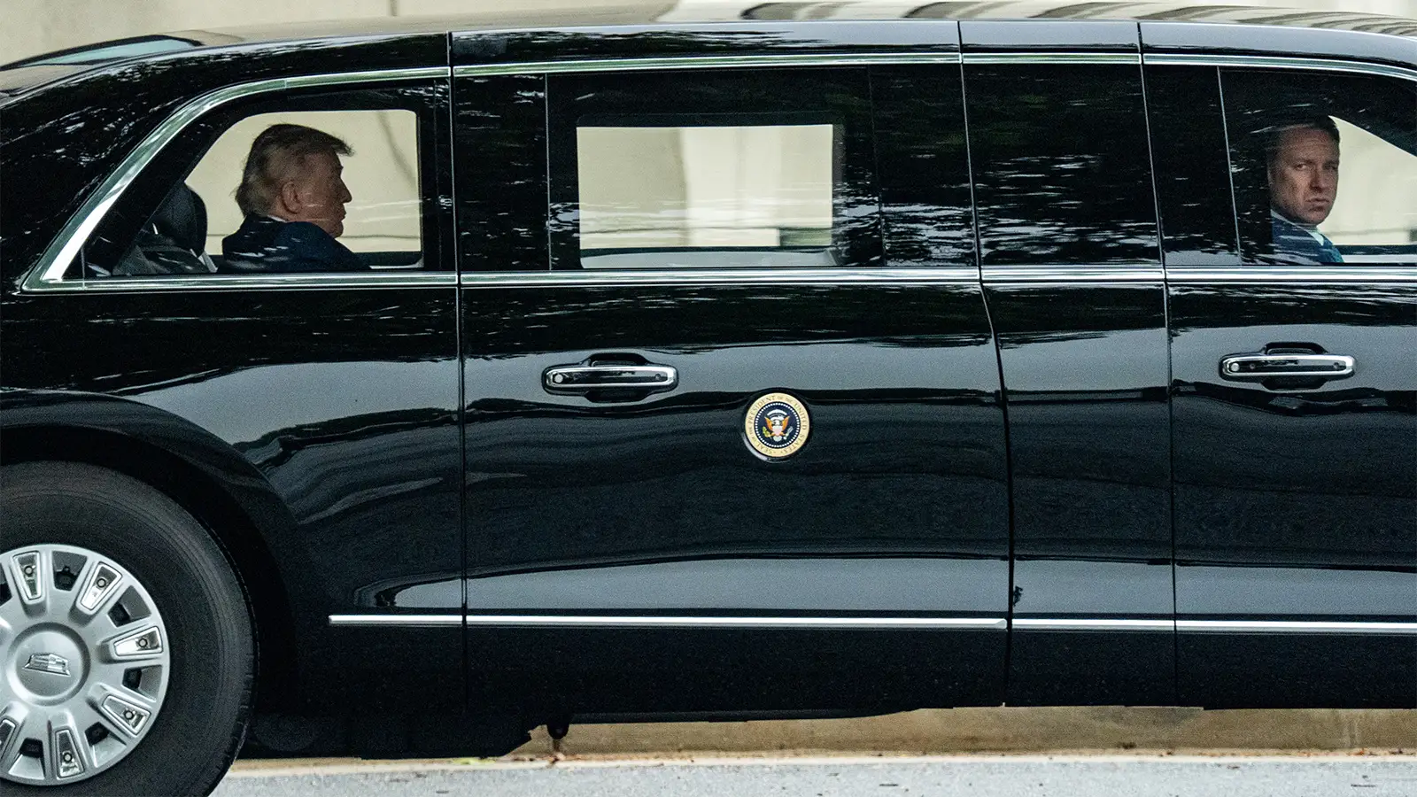 A photo of Trump departing Walter Reed National Military Medical Center in Bethesda, Maryland on May 26, 2026.