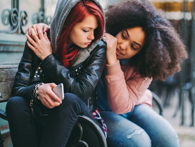 Healing After the Fire | Kaiser Permanente teenagers consoling each other