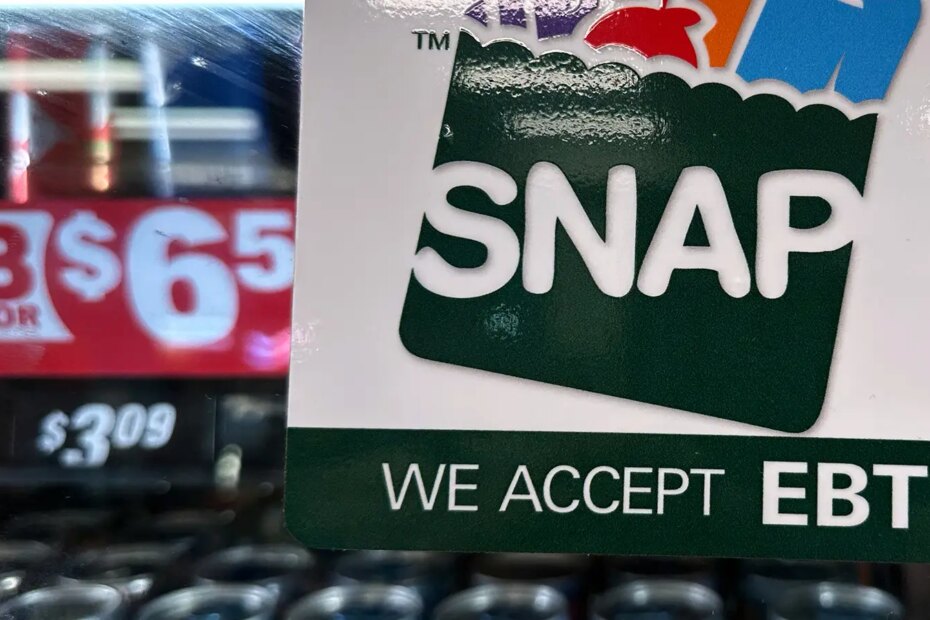 A photo of a SNAP EBT information sign at a gas station in Riverwoods, Illinois.