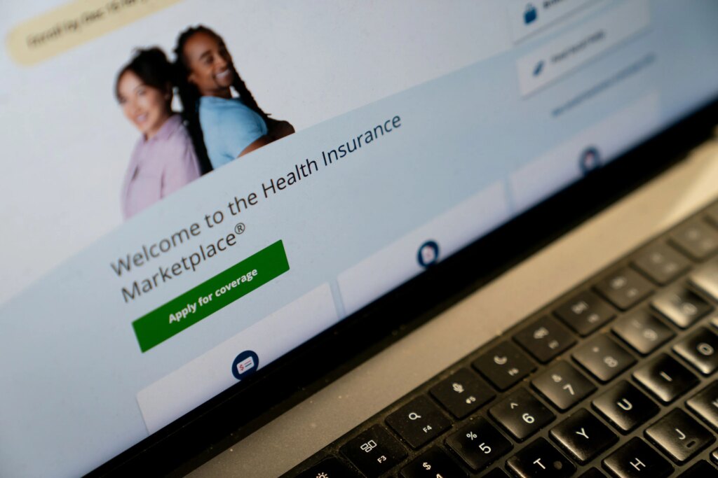 Millions of Kids Could Lose Insurance as GOP Healthcare Cuts Start To Bite A image of the healthcare.gov website on a laptop screen.