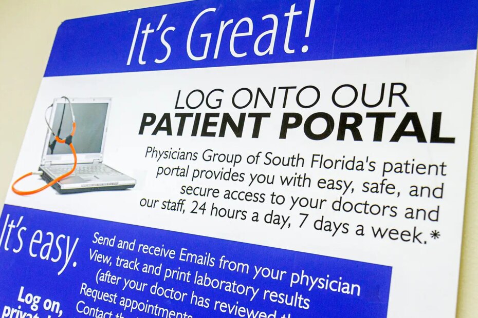 An advertisement for a hospital’s patient portal on the wall of an examination room.