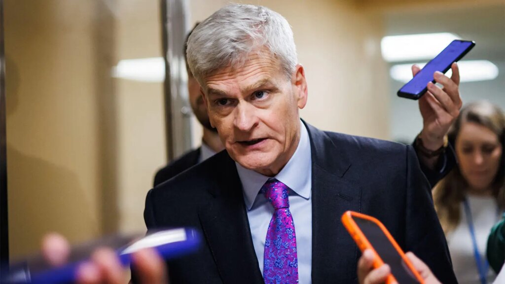 Senator Cassidy Calls Out RFK Jr. A photo of Sen. Bill Cassidy talking to reporters.