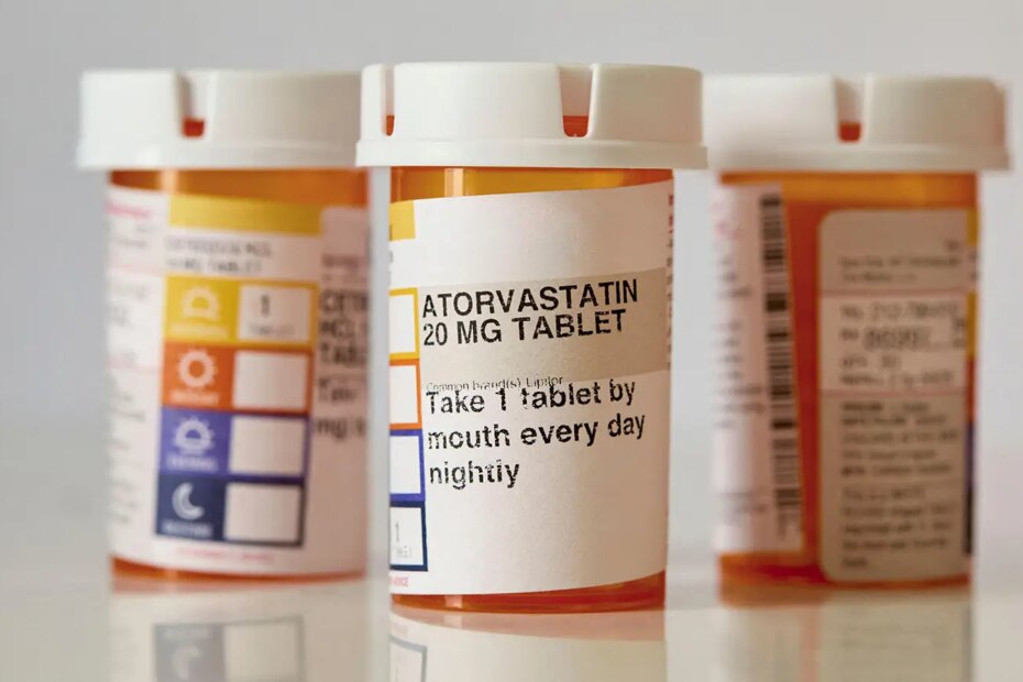 A photo of a prescription bottle of atorvastatin tablets.