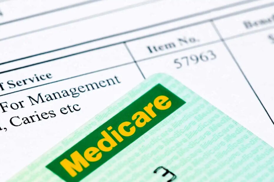 A Medicare card on top of a medical bill