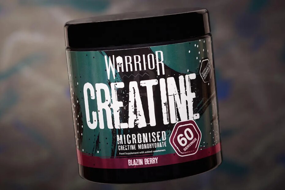 A photo of a jar of creatine powder.