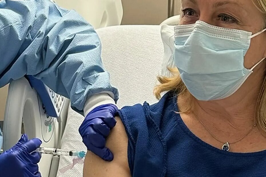 A photo of Dr. Stacy Norton receiving a trial vaccine for Lynch Syndrome at the MD Anderson Center in Houston.